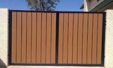 Brown wooden gate with black frame.