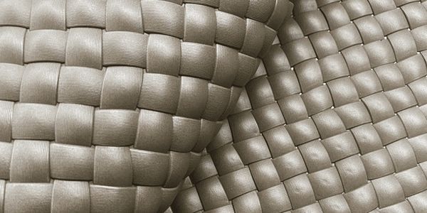 Close-up of beige woven fabric.