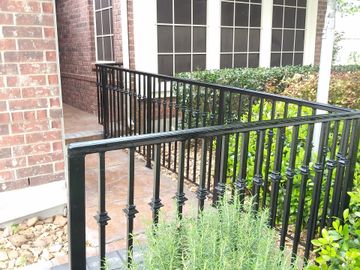 Fresh painted metal railings with a brand new roof!