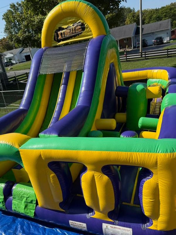 Inflatable Obstacle Course with racing slides. Available to Rent