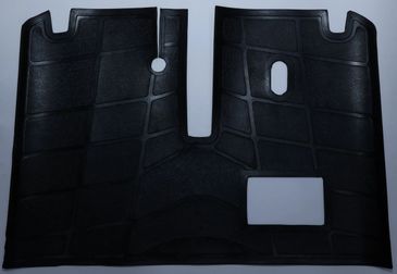 Black textured mat with cutouts, possibly for vehicle flooring.