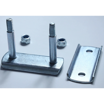 Metal hinge components with two bolts and nuts on a flat surface.