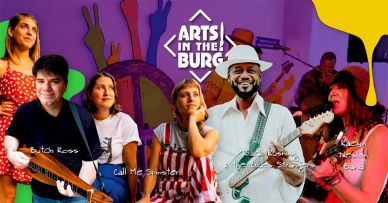 Diverse group of musicians from Arts in the Burg holding instruments with colorful backdrop.