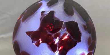 Texas Maroon Memory Ornament by Appalachian Glass of Weston, West Virginia.