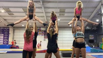 Acrobatics Tumbling A&T team sports acro tumbling toss pyramid acrobatic lifts flexibility