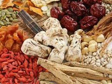 Various dried medicinal herbs and roots.