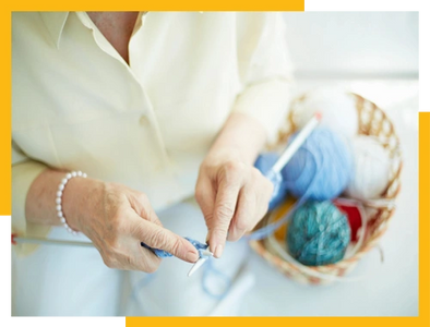 Woman knitting.