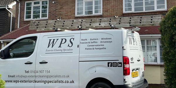 WPS Exterior Cleaning Van outside a house