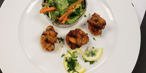 Everything Coffee
Coffee marinated grilled shrimps, fresh salad with coffee vinaigrette.