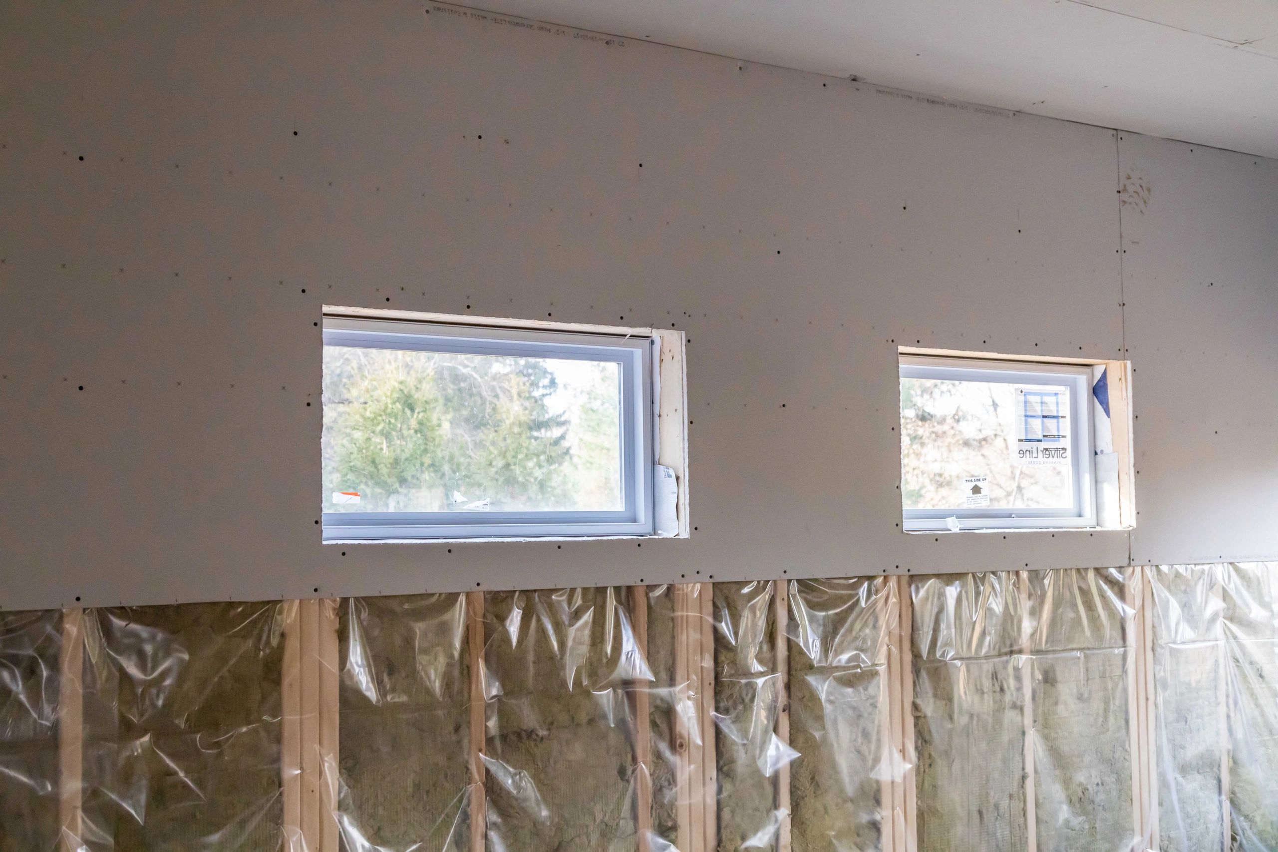 Hanging Drywall and Blowing R60 Attic Insulation