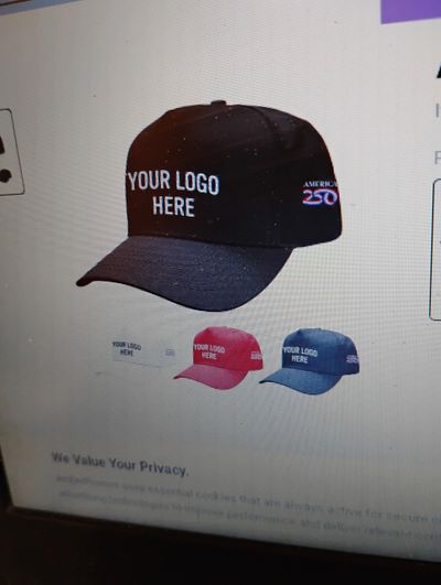 Customizable baseball caps in black, red, and blue with 'YOUR LOGO HERE' text.
