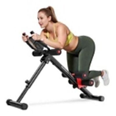Woman exercising on a fitness machine.