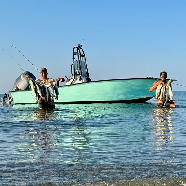 Bay boat fishing wade fishing trout redfish flounder stringer inshore fishing charter 