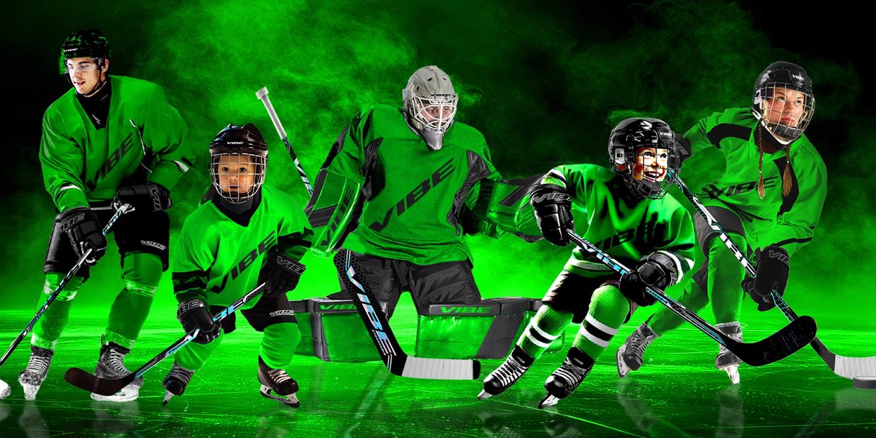 A diverse group of hockey players in vibrant green uniforms on ice.