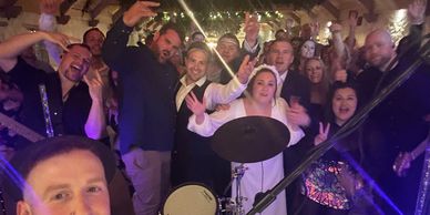 Wedding guests party with live entertainment