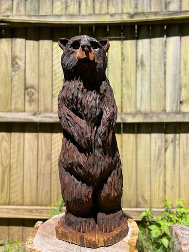 3 foot tall bear carved from a cedar log 