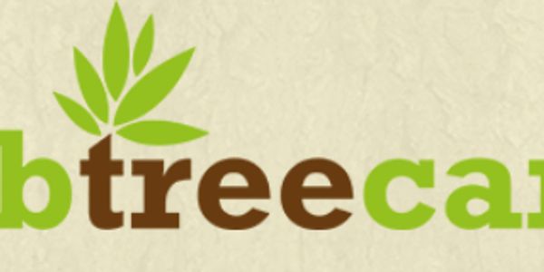 Logo with green leaves above company name.