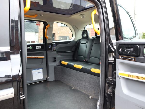 First class interior for a tour of London by Taxi