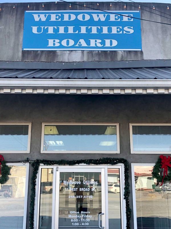 Front entrance of Wedowee Utilities Board with holiday decorations.