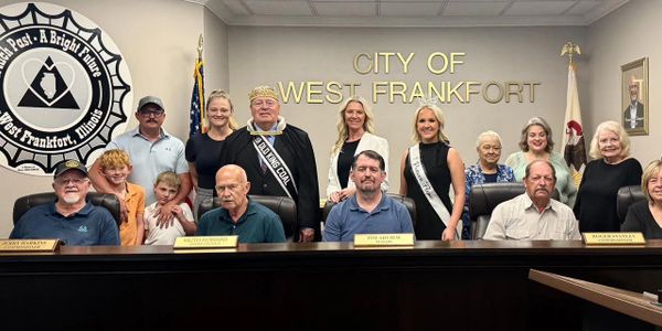Group photo of city officials and community members in West Frankfort.
