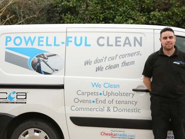 Eastbourne Carpet cleaning van with man standing in front of it.