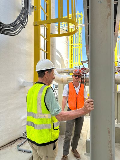 American Fiberglass Services field technicians conducting on-site assessment of FRP storage tanks, Phoenix, Arizona.