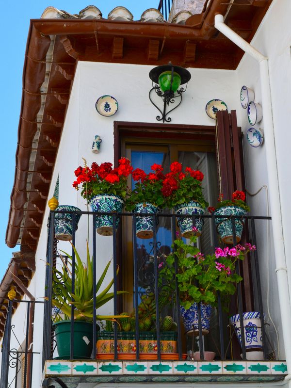 A well-decorated balcony in Granda, Spain