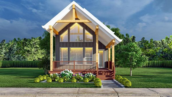 Modern small house with A-frame roof and garden.