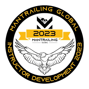 Emblem for Mantrailing Global Instructor Development 2023 featuring an eagle and mountain logo.