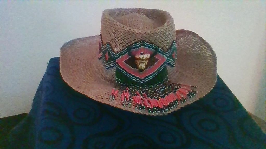 Handmade seed bead hat band in orange, dark green, brown and gold seed beads