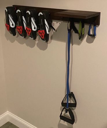 Custom workout room shelf by Gator Bill Furnishings.