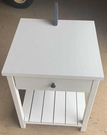 A shark side table by Gator Bill Furnishings.