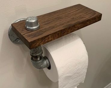 Toilet paper roll holder by Gator Bill Furnishings.