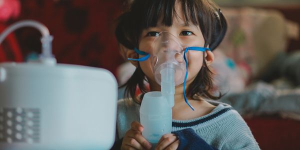 Child having a breathing treatment