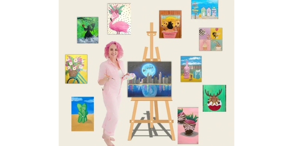 Juliet, the artist with paintings from the Imagine Ink gallery.