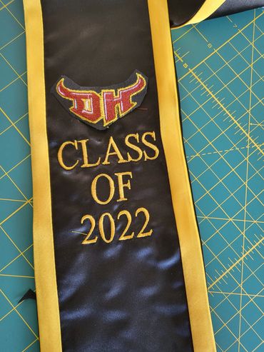 The customer needed a sash for her graduation on Saturday. She came to us on Friday, and we complete