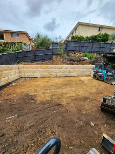 Sandstone wall construction,  natural stone, retaining wall, design, construction, landscape.
