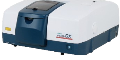 A compact, white and blue scientific instrument labeled FTIR-8X.