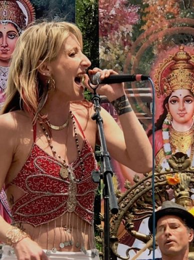 Johanna Beekman is a radiant force in the world of yoga and sacred music, weaving together kirtan an