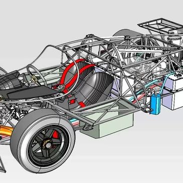 3D model of a detailed race car chassis with exhaust and suspension components.