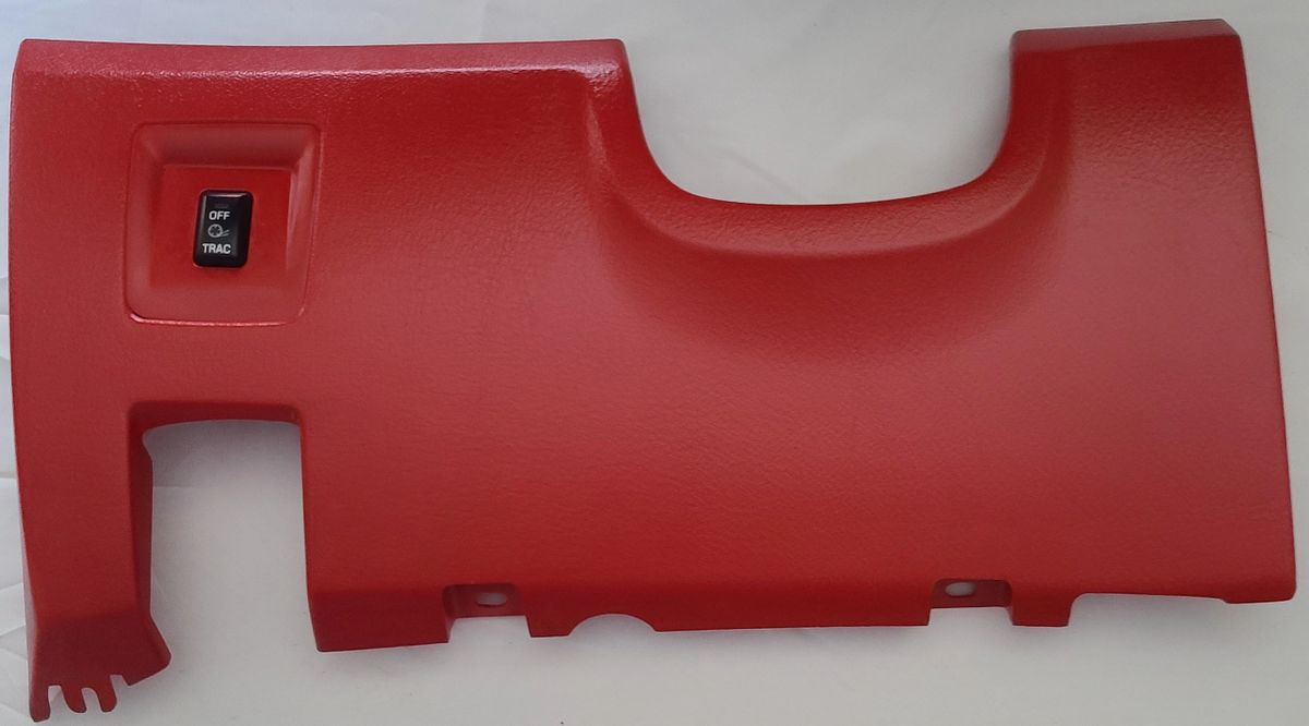 Knee bolster dashboard under steering wheel panel