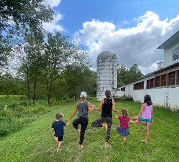 Nature yoga at Dvoor Farm in Flemington, NJ. This was a parent and child class.
