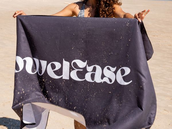 Showing sand free feature of magnetic beach towel