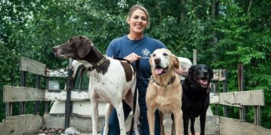 Joy Beth Cottle with her three dogs; fairbanks alaska