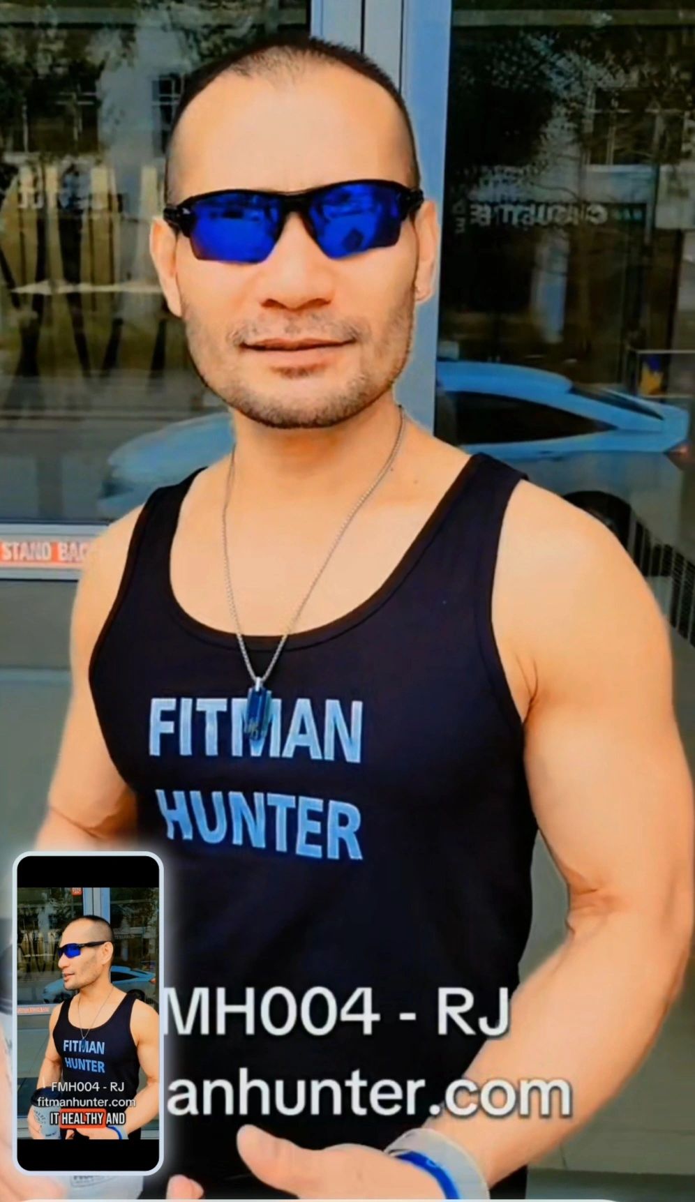 Muscular man wearing blue sunglasses and a black tank top with 'FITMAN HUNTER' text.