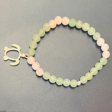 Green aventurine and rose quartz charm bracelet. 