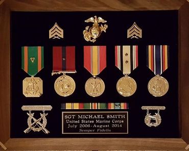 Marine SGT, sergeant, shooting badges, rifle expert badge, pistol expert badge, combat action ribbon