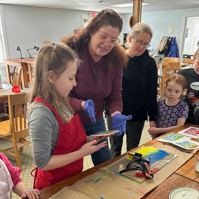 Adult and young artists learn monoprinting