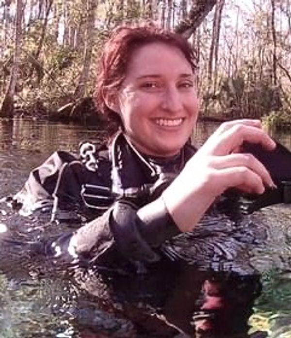 Morgan diving on a Lutra Adventures scuba trip