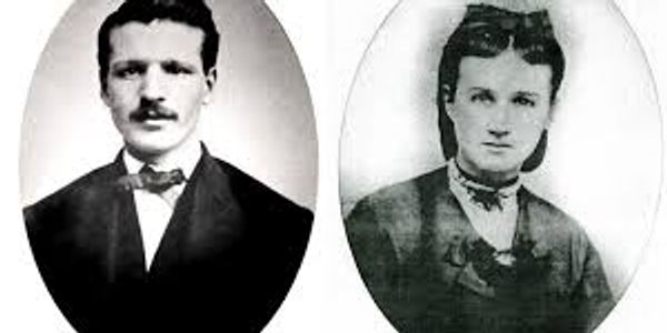 Black and white portraits of a man and a woman from the late 19th or early 20th century.